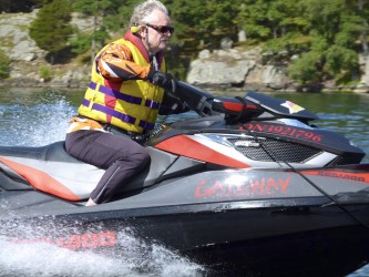 The Intrepid Cottager riding a Sea-Doo watercraft
