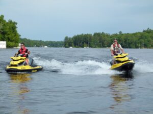 Two Sea-Doo's riding with cruise on.