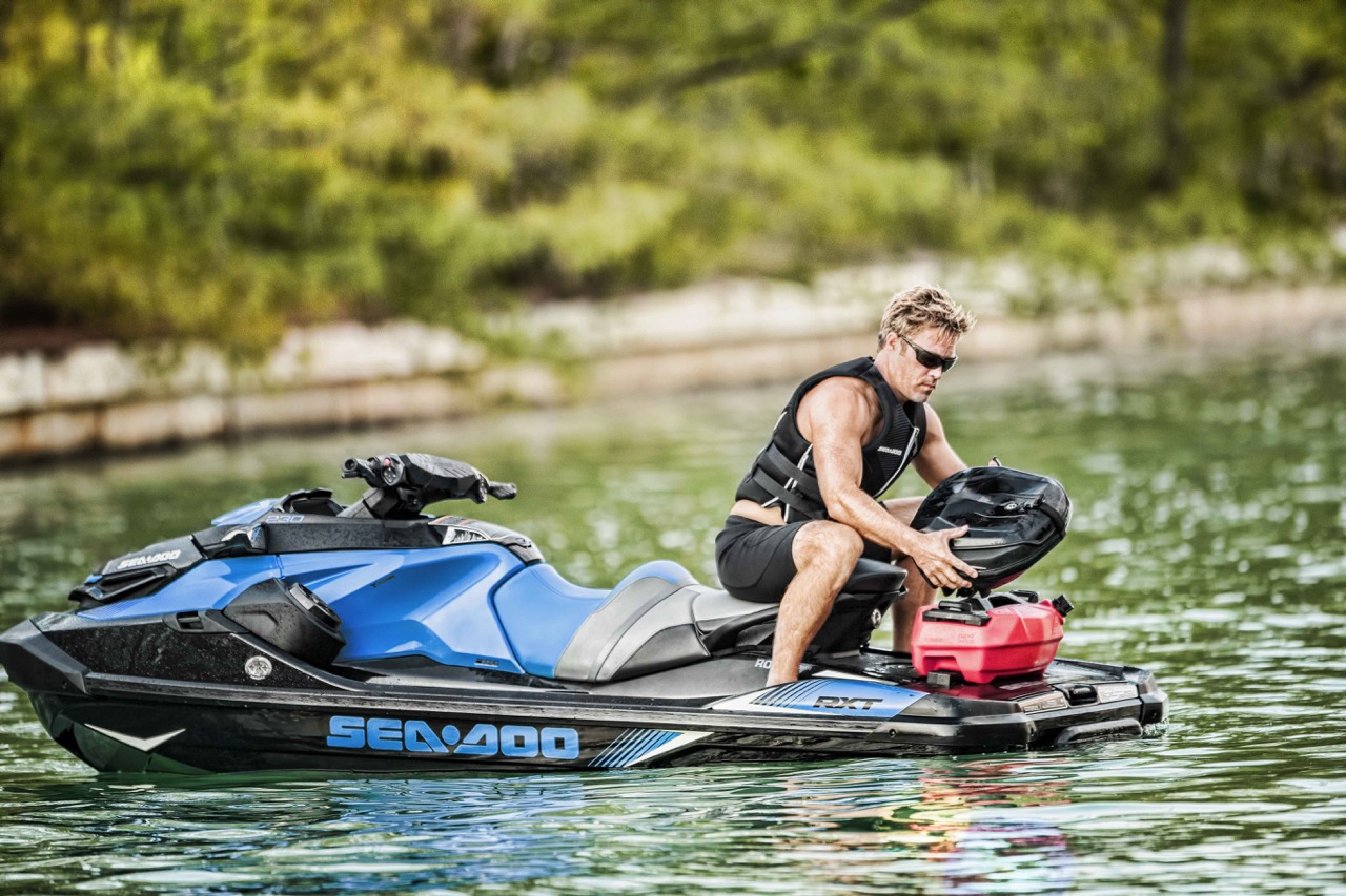 Rider installing LinQ sustem Sea Doo Storage